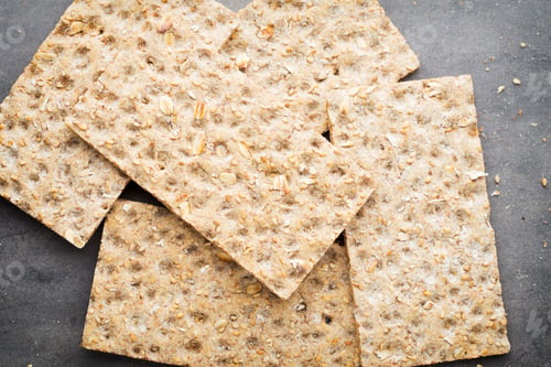 Preview: Stack Of Wholegrain Crispy Bread With Sunflower, Chia And Sesames Seeds
