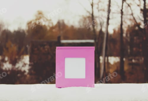 Preview: Decorative Pink Gift Box Standing On Fresh Snow Outdoors
