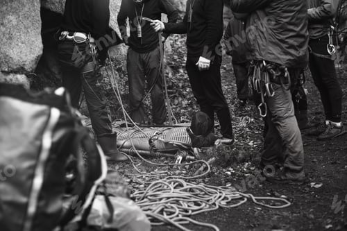 Preview: Group Of Rock Climbers And The Body Of The Injured Laid On A Stretcher For Transportation, During