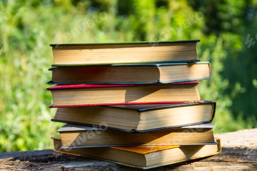 Preview: Stack Of Old Books On Wooden Table Outdoor