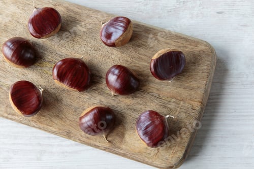 Preview: Bunch Of Fresh Raw Chestnuts In Autumn Season