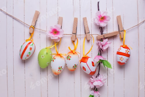 Preview: Colorful Easter Eggs On Clothes Rope. Easter Background.