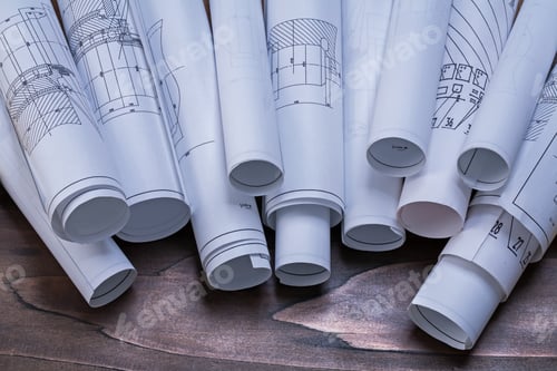 Preview: Rolls Of Construction Plans On Pine Wooden Vintage Board Maintenance Concept