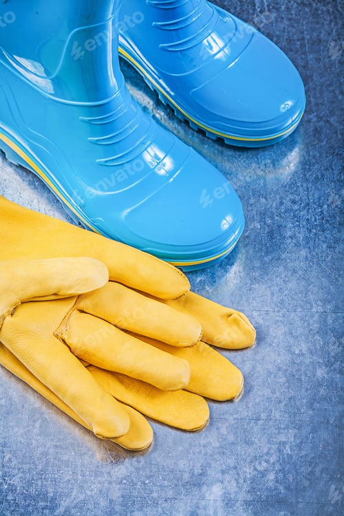 Preview: Protective Gumboots Leather Gloves On Metallic Background Gardening Concept.