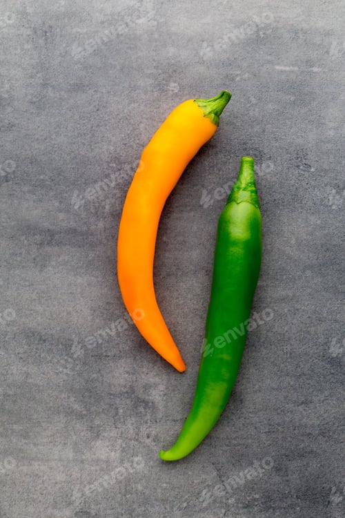 Preview: Chilli Pepper On The Grey Background.