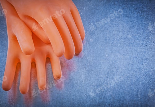 Preview: Electricians Rubber Gloves On Metallic Background Electricity Concept.