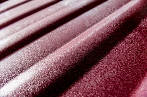 Preview: Red Metallic Roof Tiles Background With Drops Of Water.