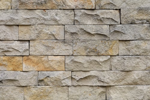 Preview: The Wall Is Made Of Decorative Wild Stone. Background Or Graphic Resource.