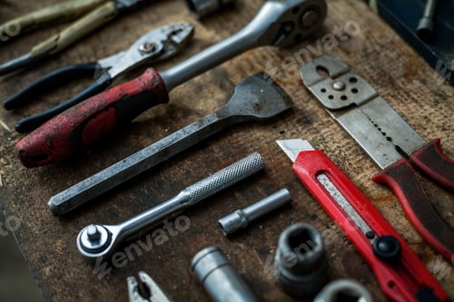 Preview: Color Image Of Many Tools On A Wooden Plank.