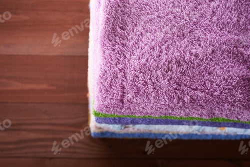 Preview: Many Stacked A Pile Of Towels On Wooden Table