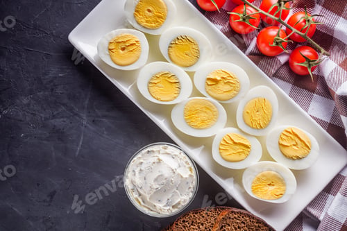 Preview: Boiled Chicken Eggs On A Dark Stone Background