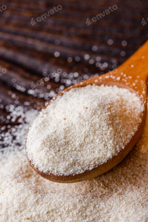 Preview: Natural Organic Semolina On Dark Wooden Rustic Background