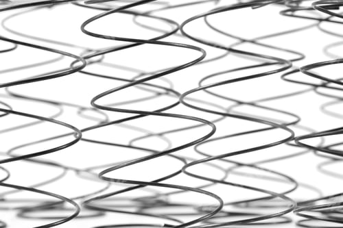 Preview: A Lot Of Steel Springs Isolated On A White Background.