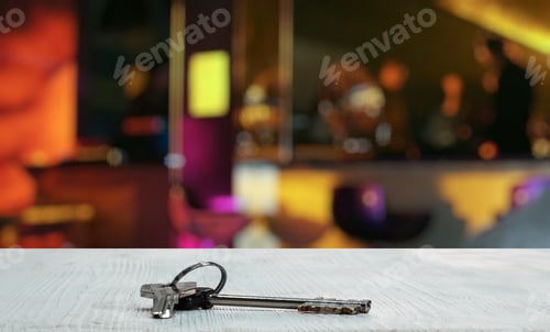Preview: Keys On White Table In A Night Club