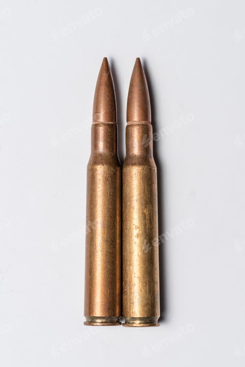 Preview: Two Rifle Bullets On White Background.
