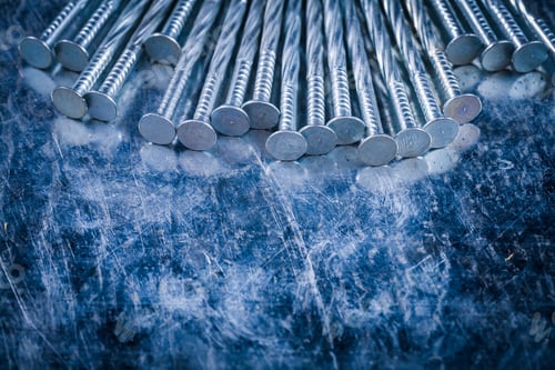 Preview: Stack Of Metal Construction Nails On Scratched Metallic Background Copy Space Image Building