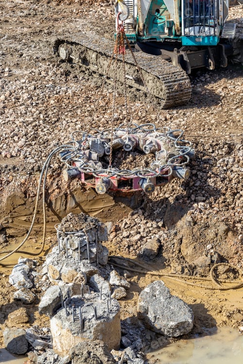 Preview: Hydraulic Rock Cutter Concrete Pile Breaking, Unit Drops Over The Top Of The Pile Then The Powerful
