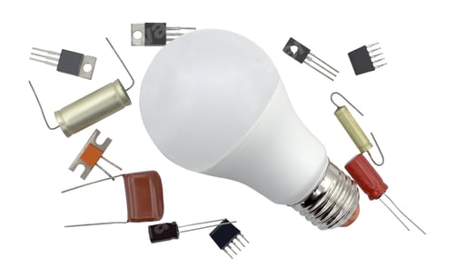Preview: Led Energy Saving Bulb And Radio Components On White Background