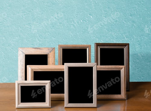 Preview: Wooden Photo Frames On Table, Blue Wall