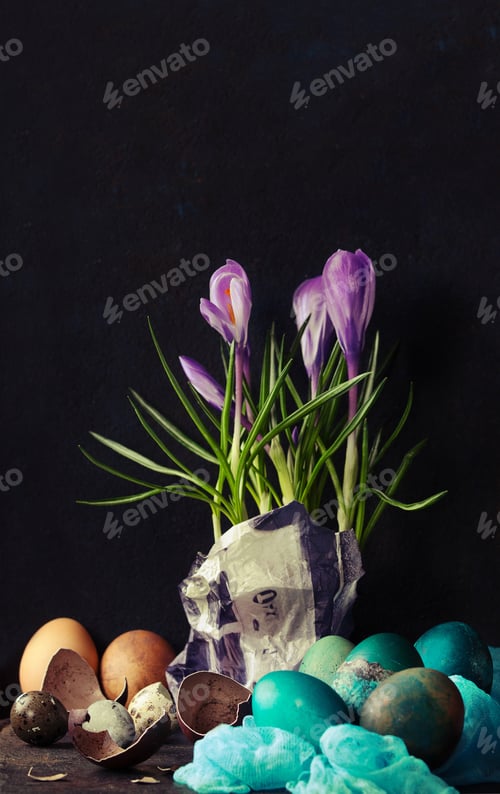 Preview: Traditional Colored Easter Eggs With Flowers And Napkin Over Dark Background