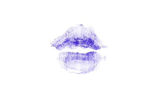 Preview: Color Lipstick Kiss Mark On White Background. Beautiful Lips Isolated On White. A Bright Imprint Of