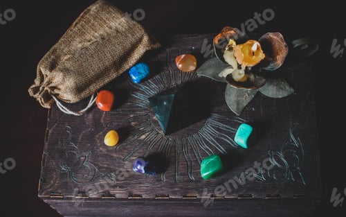Preview: A Fortune Teller, Witch Stuff On A Table, Candles And Fortune-Telling Objects. The Concept Of