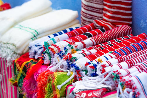 Preview: Moroccan Fabrics In The Store, Chefchaouen, Morocco. With Selective Focus
