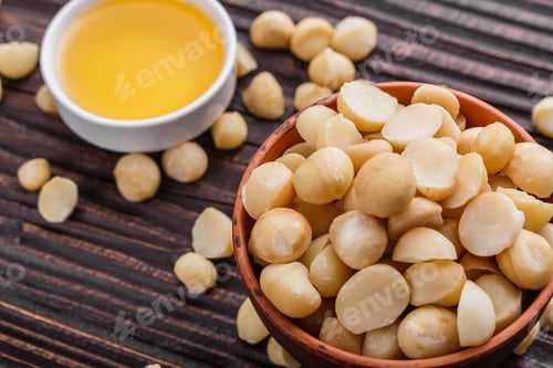 Preview: Delicious Macadamia Nuts On A Wooden Rustic Background
