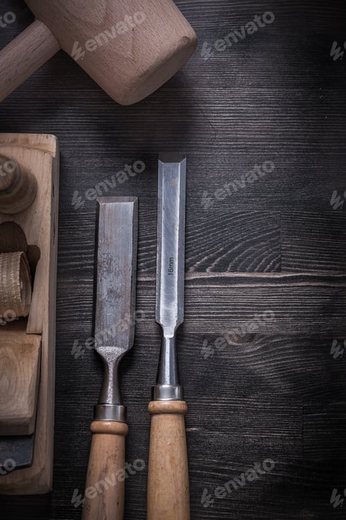 Preview: Firmer Chisels Planer Lump Hammer On Wood Board Construction Concept.