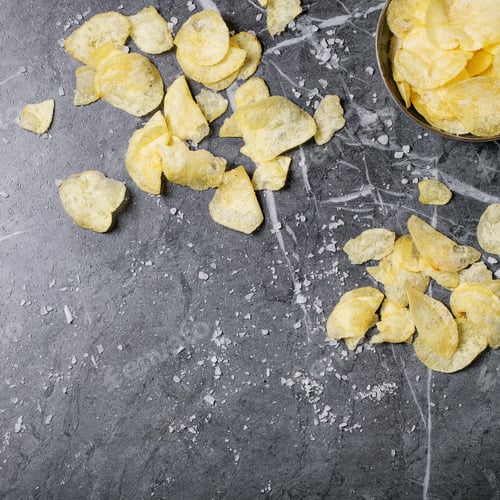 Preview: Bowl Of Home Made Potato Chips Served On Dark Texture Background. Top View, Flat Lay. Copy Space