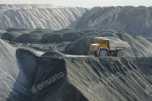 Preview: Mining Dump Truck In A Stone Quarry On The Background Of Hills Of Crushed Stone.