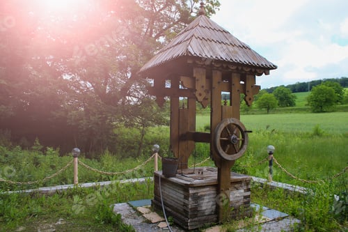 Preview: Rustic Classic Wooden Well In Sunny Exposure. Background, Toned.