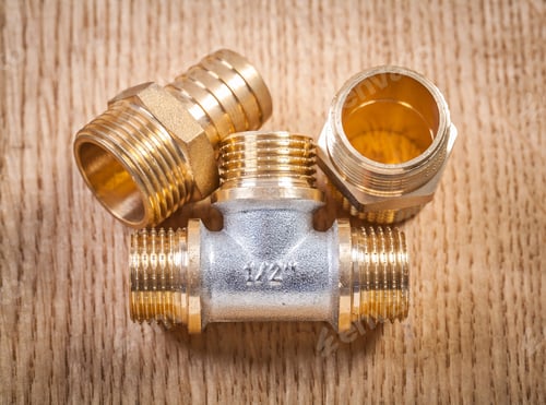Preview: Plumbing Fixtures On Wooden Board