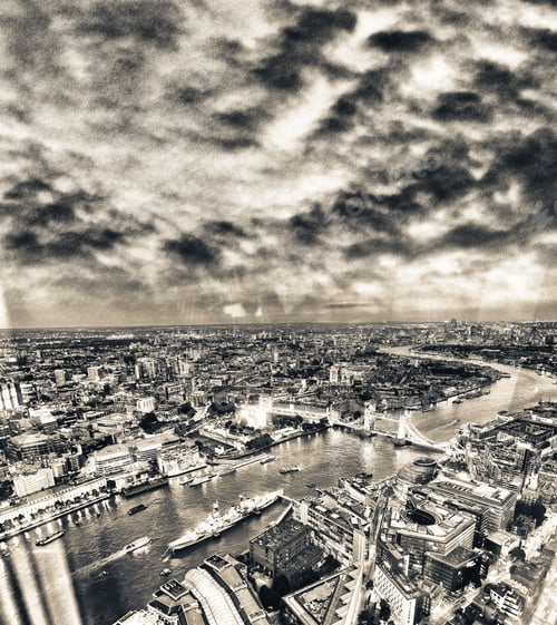 Preview: Tower Bridge And City Skyline Along River Thames At Night, Aerial View - London - Uk.