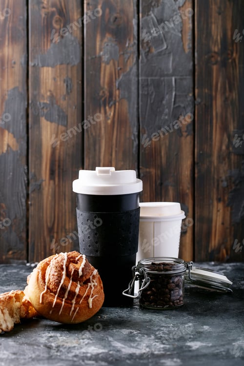 Preview: Baked Cinnamon Buns Served With Cinnamon And Coffee Over White Texture Background. Take Away Concept