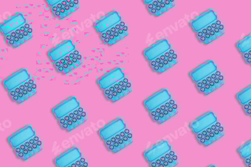 Preview: Creative Christmas Pattern With Christmas Tree Decorations In Paper Egg Tray On Pink Background