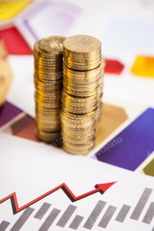 Preview: Stacked Coins on Financial Graph Showing Growth