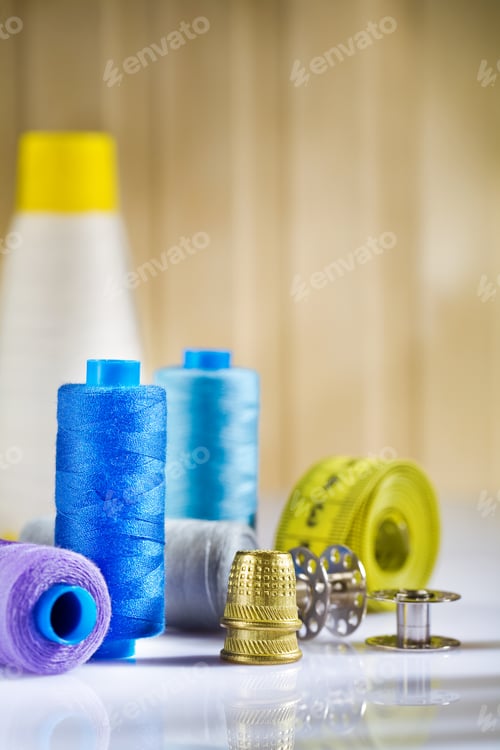 Preview: Composition Of Sewing Items On A White Wooden Table