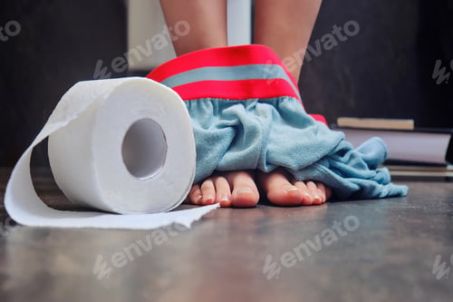 Preview: Men'S Foot With Their Pants Down On The Toilet Floor. Concept Of Problems With Diarrhea And