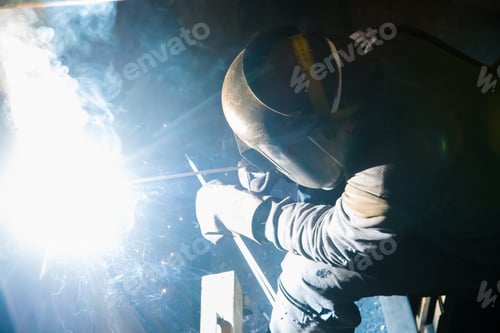 Preview: Sparks While Welder Uses Torch To Welding