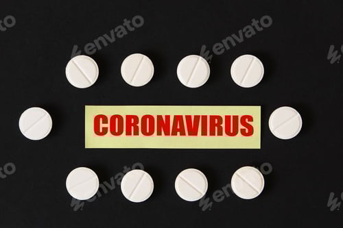 Preview: Pills Arranged Around Coronavirus Cautionary Message