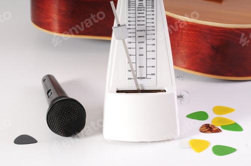 Preview: Guitar And Microphone On A White Background