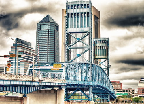 Preview: Jacksonville Skyline With Bridge And Buildings On A Overcast Day.