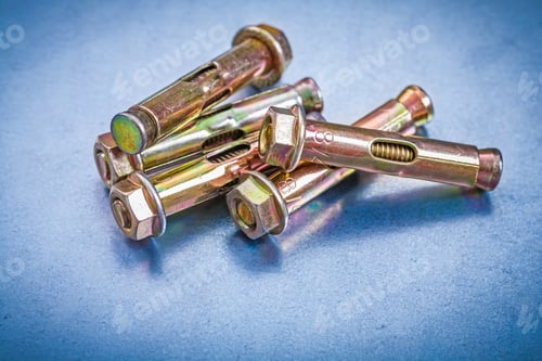 Preview: Set Of Metal Anchor Bolts For Concrete Walls On Metallic Background Construction Concept