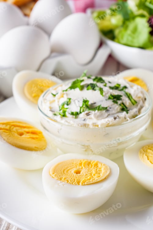 Preview: Boiled Chicken Eggs On A White Wooden Rustic Background