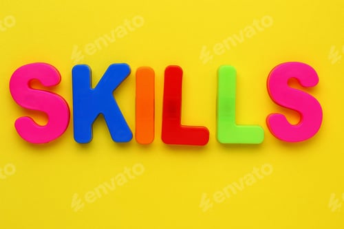 Preview: Text Made In Multicolored Magnetic Letters. Skills. Yellow Background