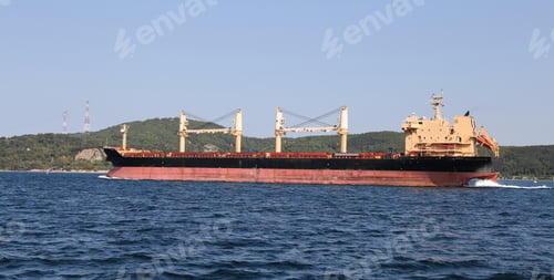 Preview: A Cargo Ship Carrying Goods Between Ports
