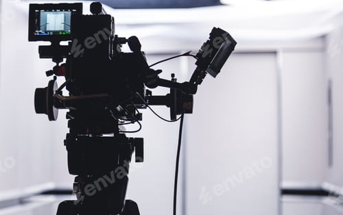 Preview: Camera Equipment Standing in an Empty Modern Studio