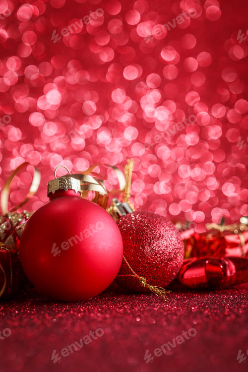Preview: Christmas Composition Of Christmas Tree Toys On A Blurred Red Background