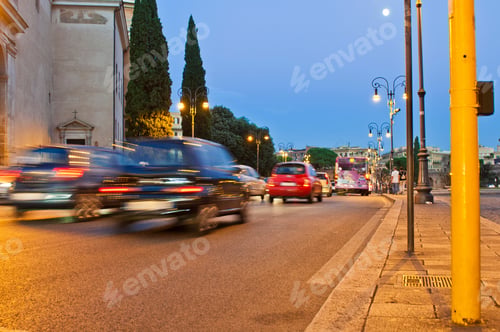 Preview: Stunning Night Traffic Scene At Piazza Di Porta San Giovani In Rome, Italy